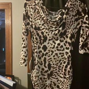 Stretchy, fitting leopard print dress.